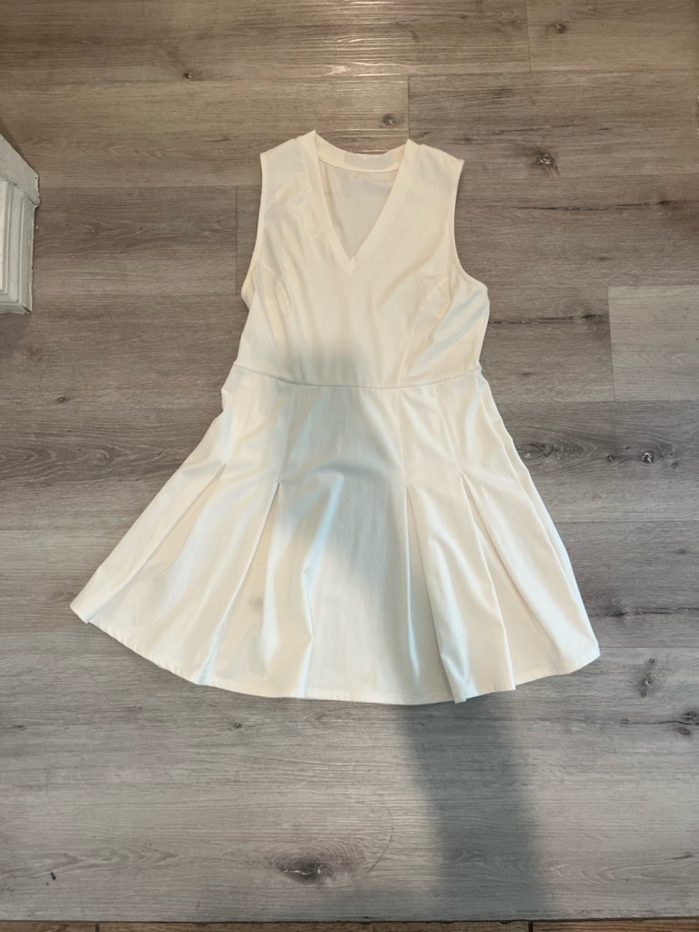 White Sleeveless V-Neck Pleated Skater Dress